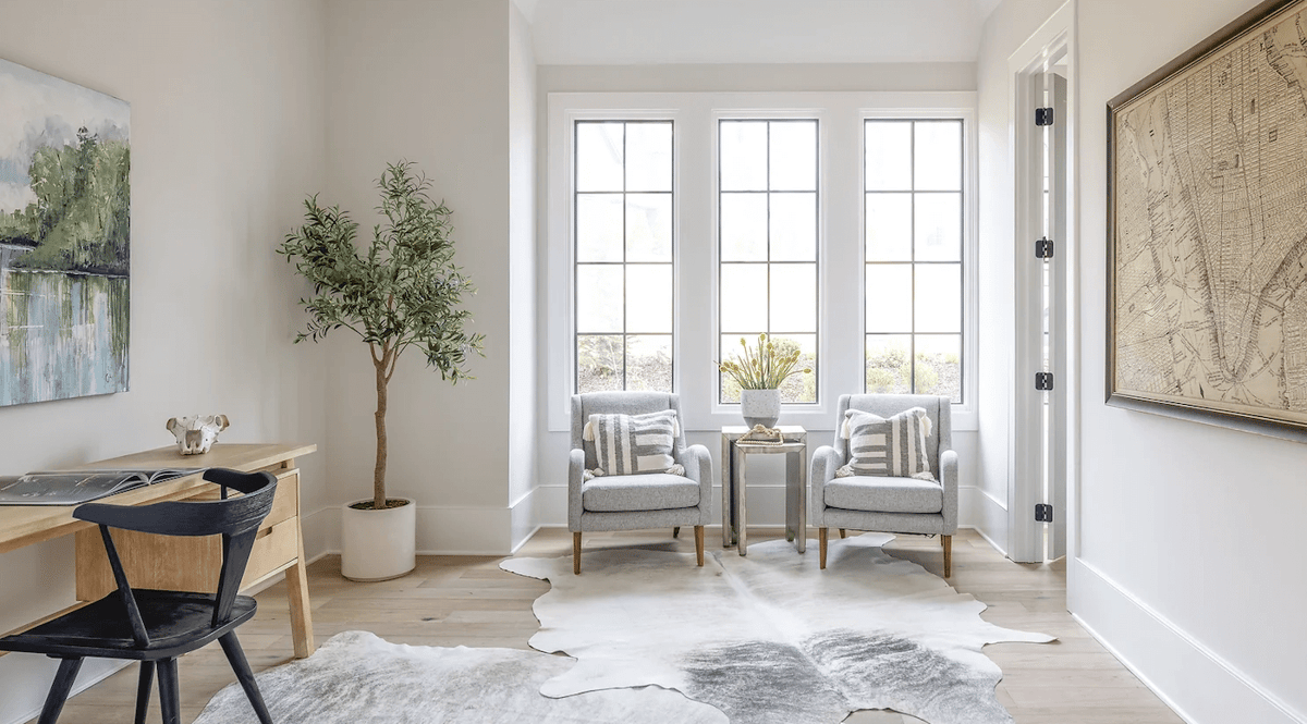 Office with floor-to-ceiling windows.